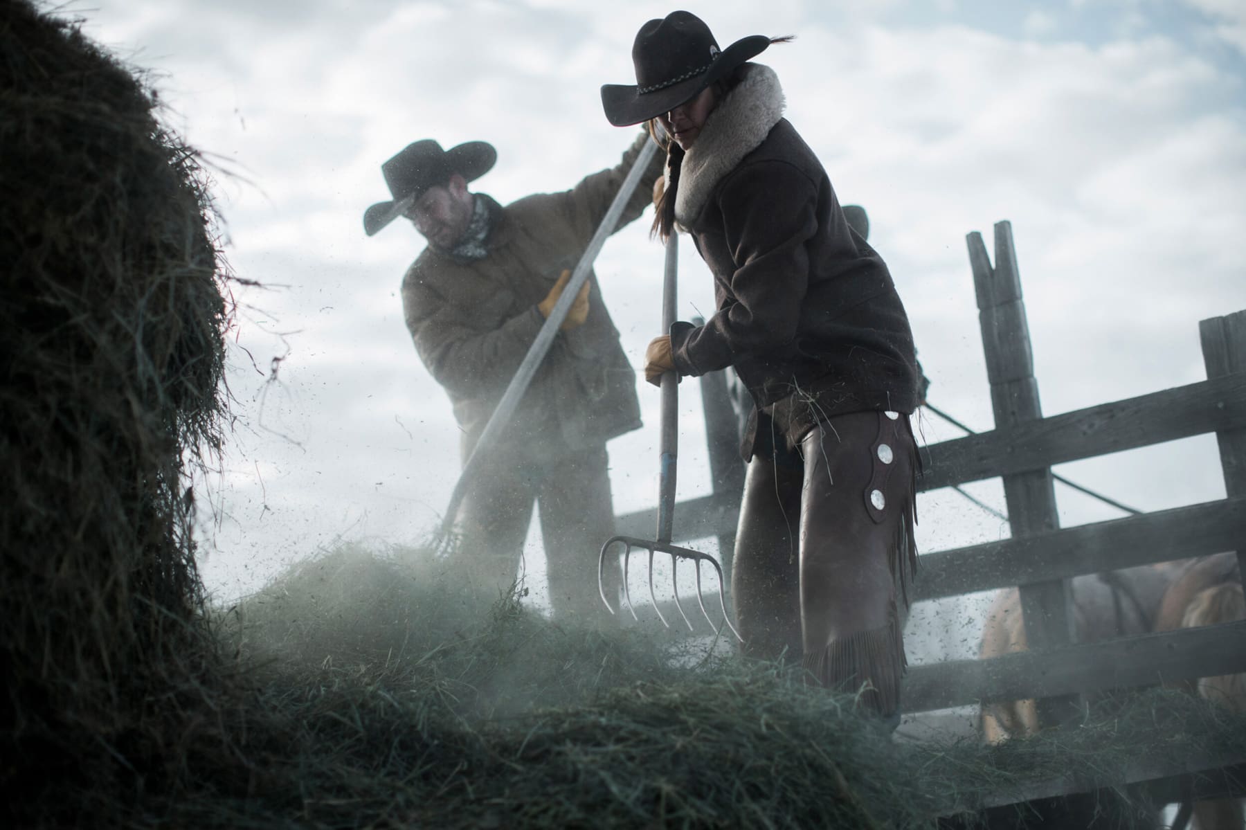 Ranchers prep hay for their horses.