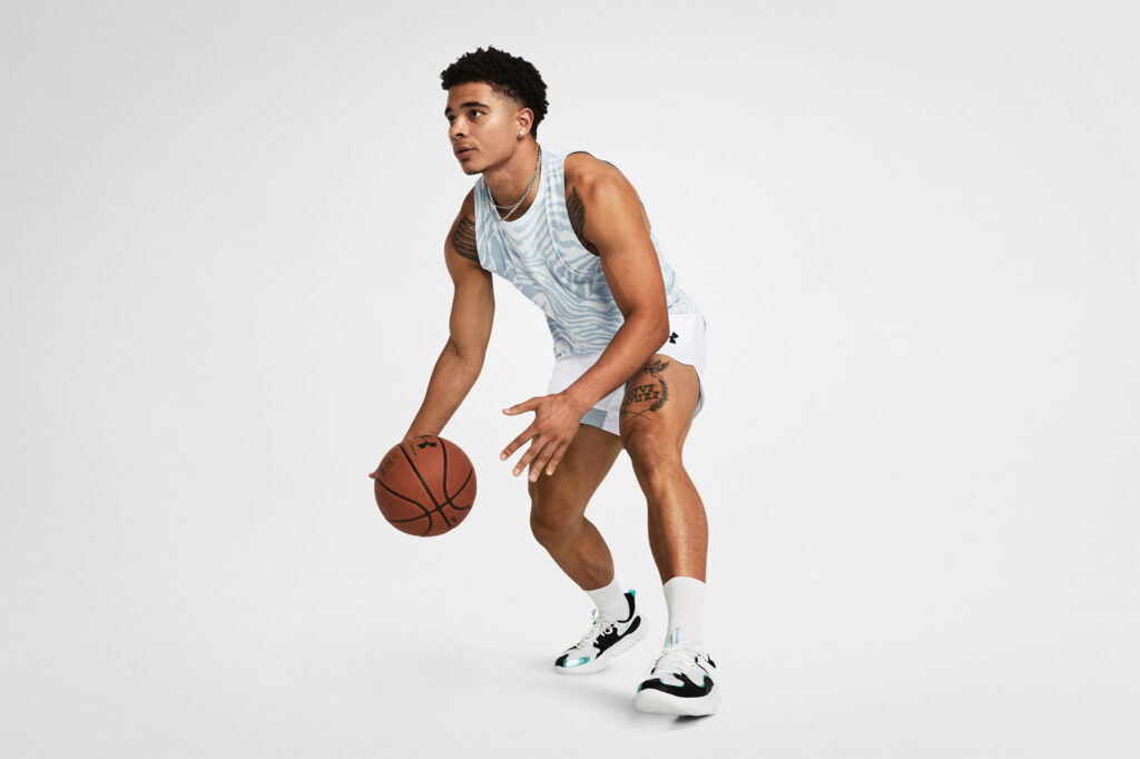 A basketball player photographed on white for a e-commerce photo shoot.